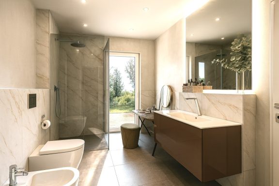 Heller, moderner Badezimmerraum mit Dusche, Waschbecken und großer Fensterfront.